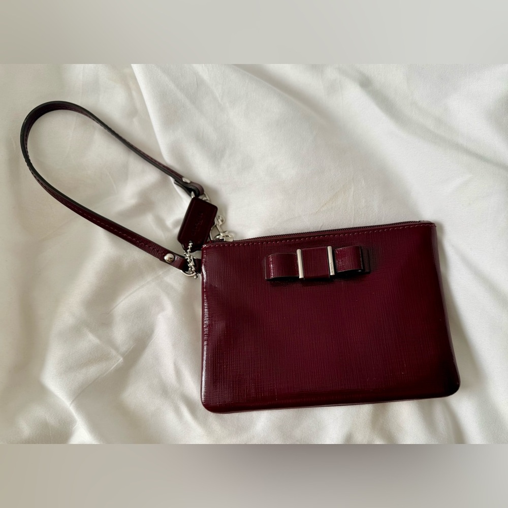 Elegant Burgundy Wristlet Bag COACH